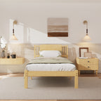 Low profile bamboo bed frame styled with minimalist neutral wall artwork