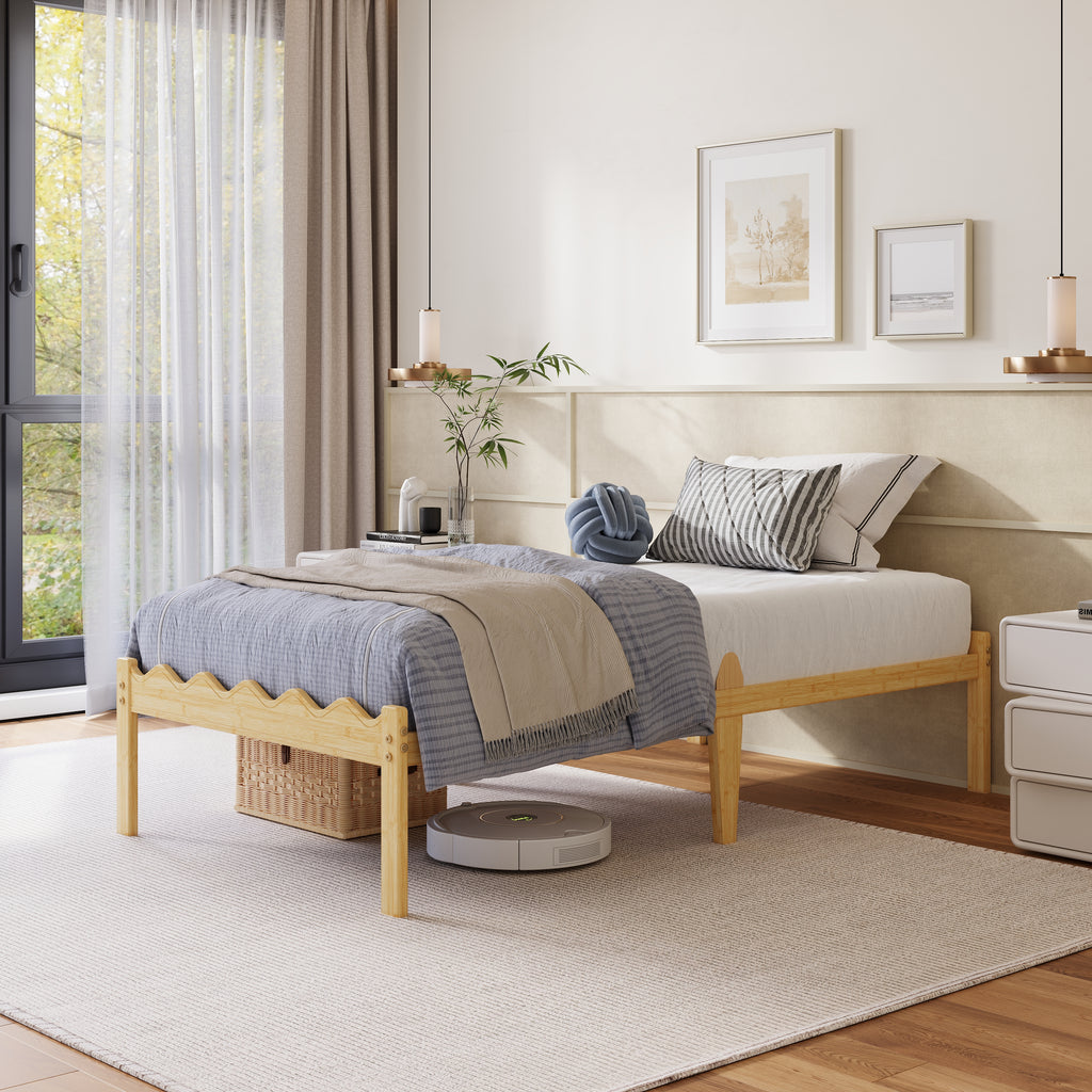 Robotic vacuum underbed clearance below beige scalloped bamboo platform bed