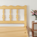 Compact guest room interior with a low clearance natural finish bed frame